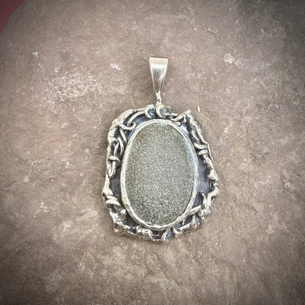River Stone and vine pendant