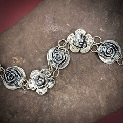 Signature rose and double dogwood bracelet
