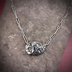 Walnut necklace with gold accent