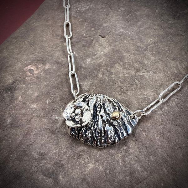 Walnut necklace with gold accent