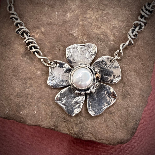 Heavy wrap vine necklace with large flower, pearl, and rose gold ball.