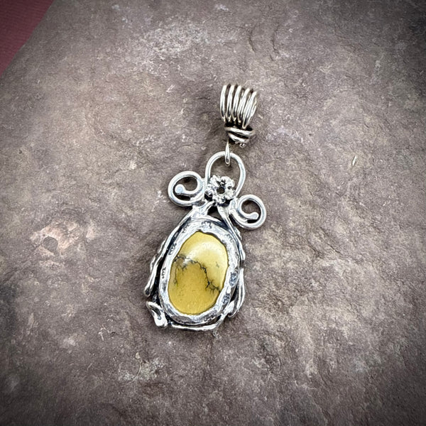 turquoise pendant with elaborate vines