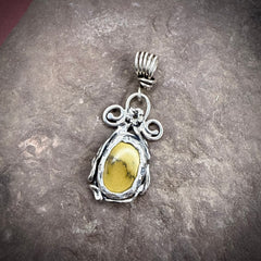 turquoise pendant with elaborate vines