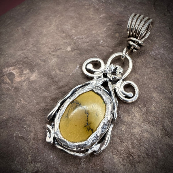 turquoise pendant with elaborate vines