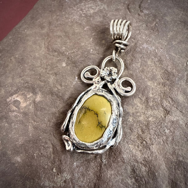 turquoise pendant with elaborate vines