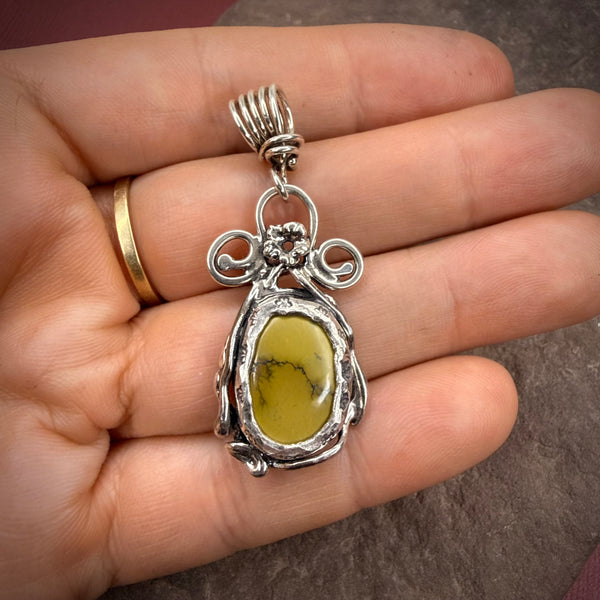 turquoise pendant with elaborate vines